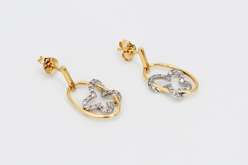 Pendiente de oro combinado de 18k con diamantes. de segunda mano. Joyería de ocasión | ROYALHYSTERIA